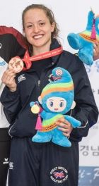 Charlotte showing off her Bronze Medal